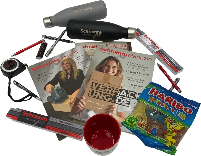 Schramm-Magazin, Schramm Aktuell, Trinkflaschen, Zollstöcke, Tasse und eine Tüte Fruchtgummi als Beigaben zur Bestellung
